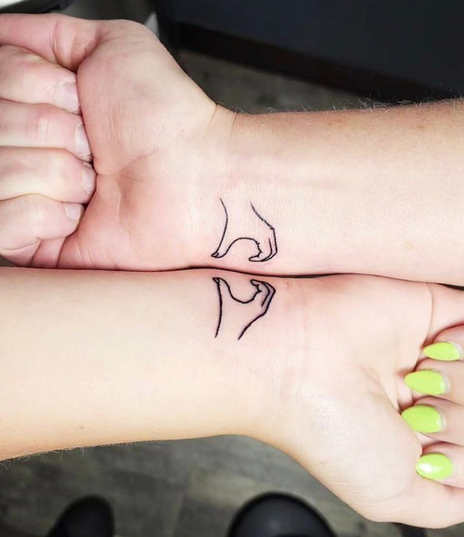 The Korean Heart duo matching tattoo